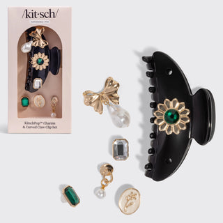 Black curved claw clip with customizable charm set featuring pearl drop and gemstone details.