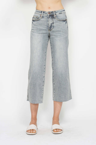 Judy Blue mid rise light wash tummy control crop wide leg jeans with raw hem