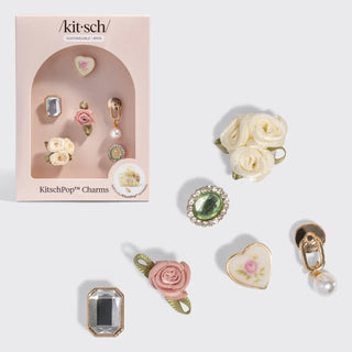 KitschPop vintage ivory charm set with floral accents, pearl detail, and gold finishes.