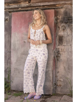 Neutral wide leg pants with blue coastal print and lace trim hem